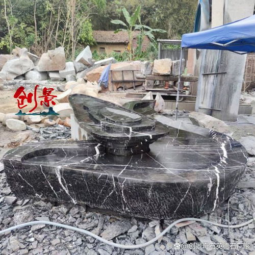 廣東異形黑山石加工廠家 黑山石水缽創(chuàng)意全面實(shí)景拍攝案例圖